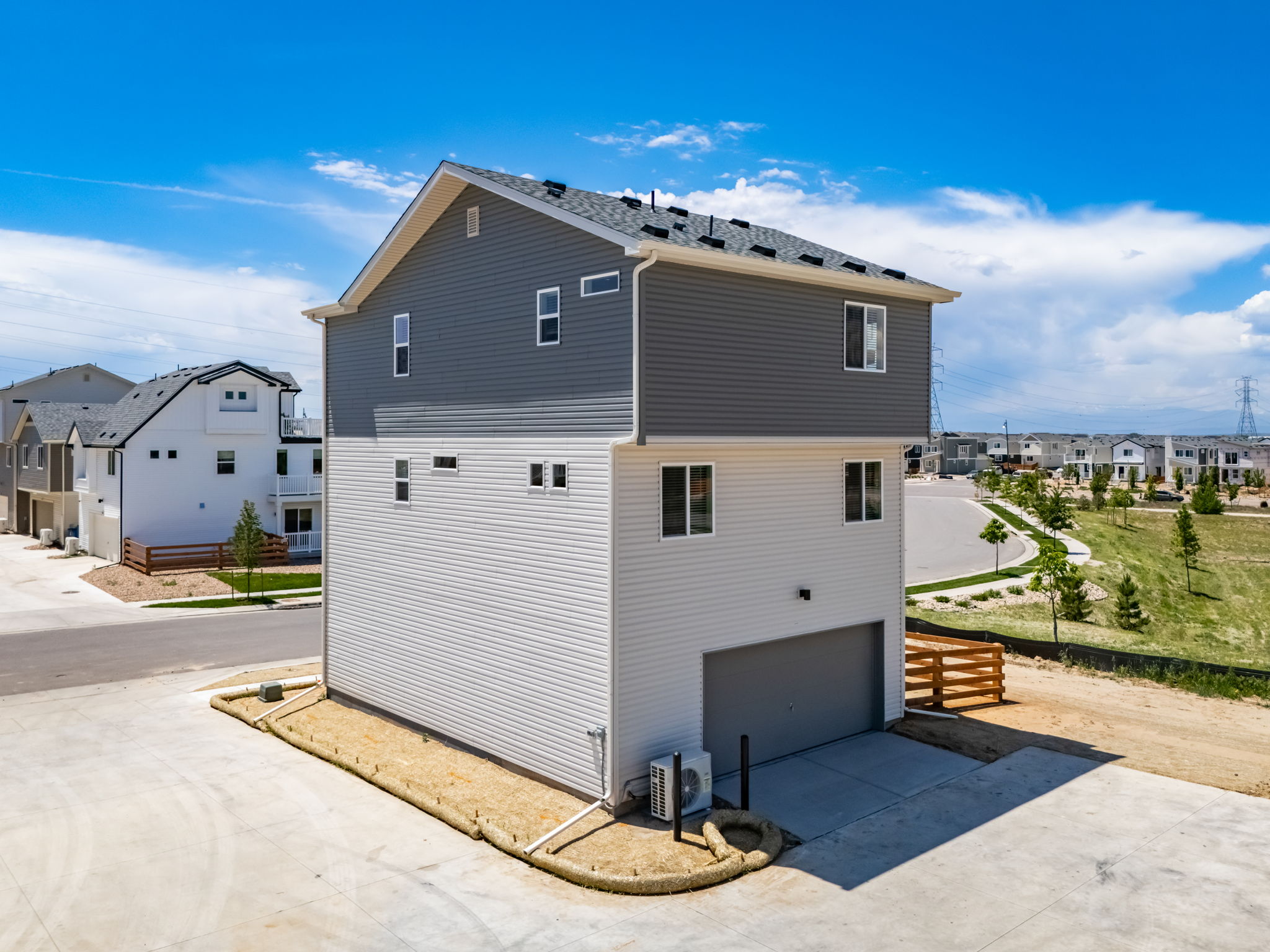 9914-Rand-American Dream-Reunion-13417 E 103rd-Rear Elevation